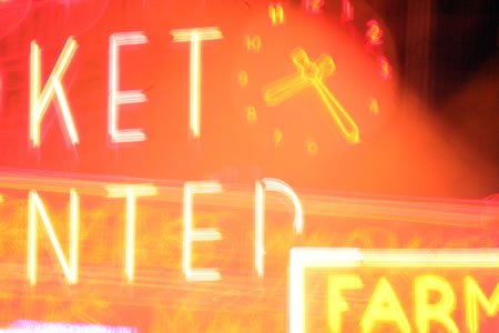 Blurry Market Sign Night